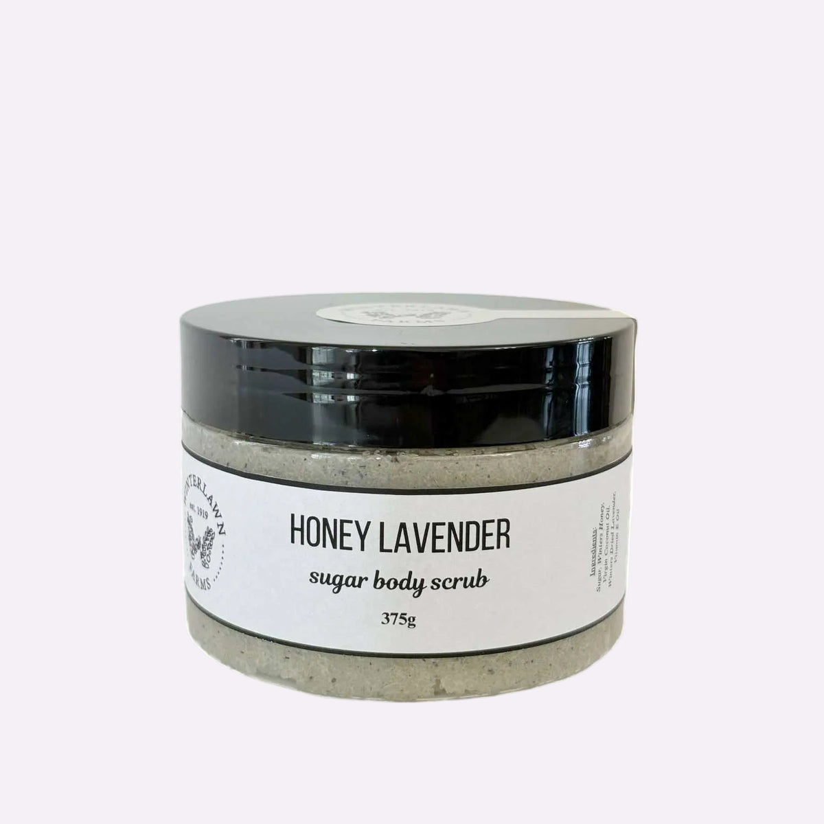 A jar of Honey Lavender sugar body scrub by Winterlawn Farms.