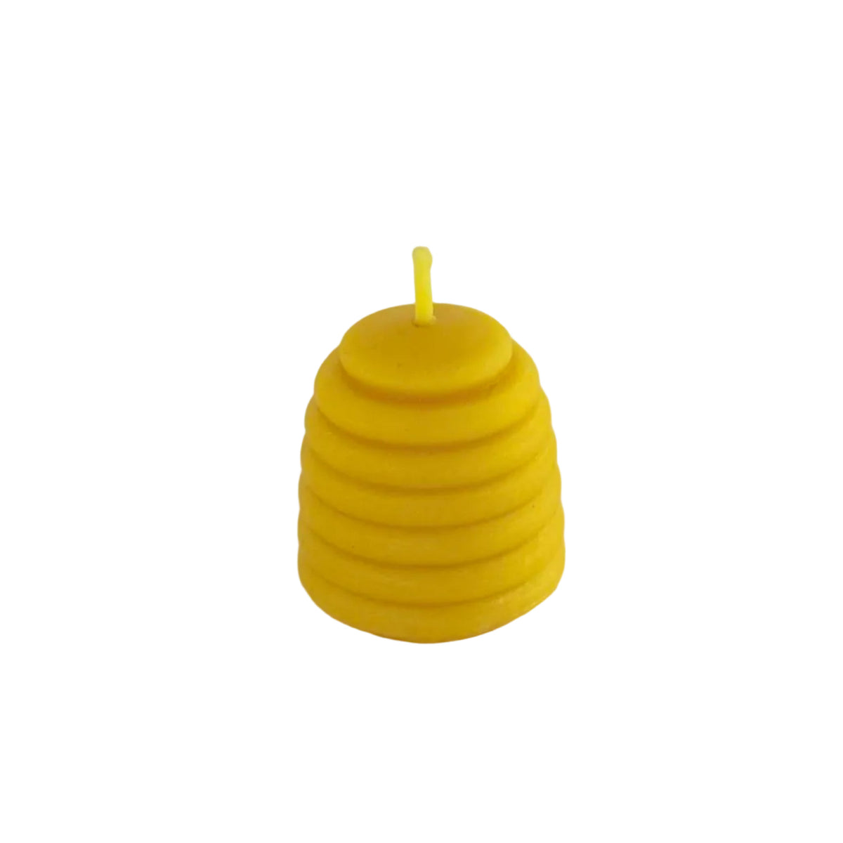 A small yellow honeycomb-shaped candle with a single wick, photographed on a plain light background.