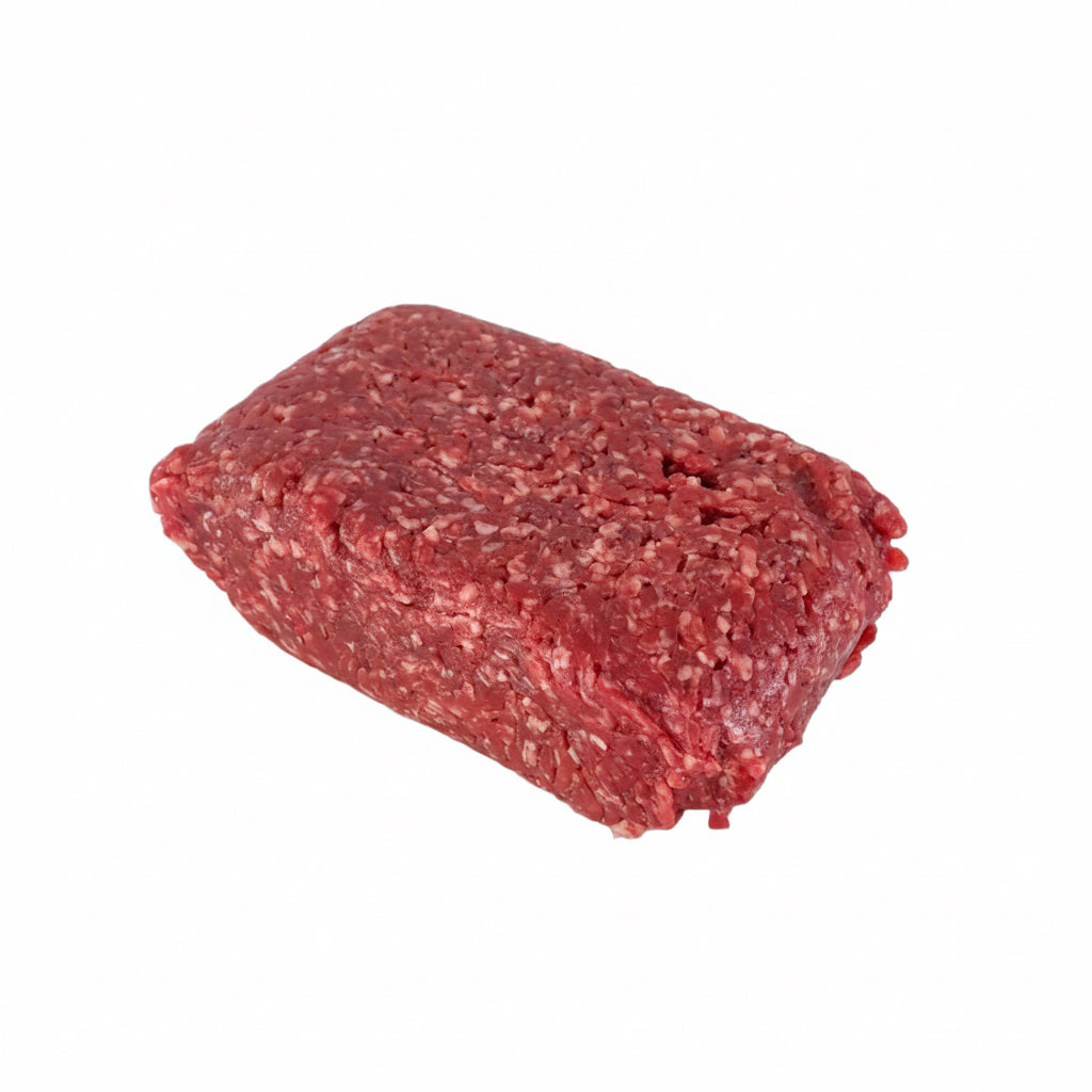 A rectangular block of raw ground meat, showing a marbled texture of red and white fat, resting on a white ceramic plate against a plain white background.