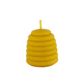 A small yellow beeswax candle shaped like a honeycomb bee's nest, featuring horizontal ridges and a short wick on top, set against a plain light background.
