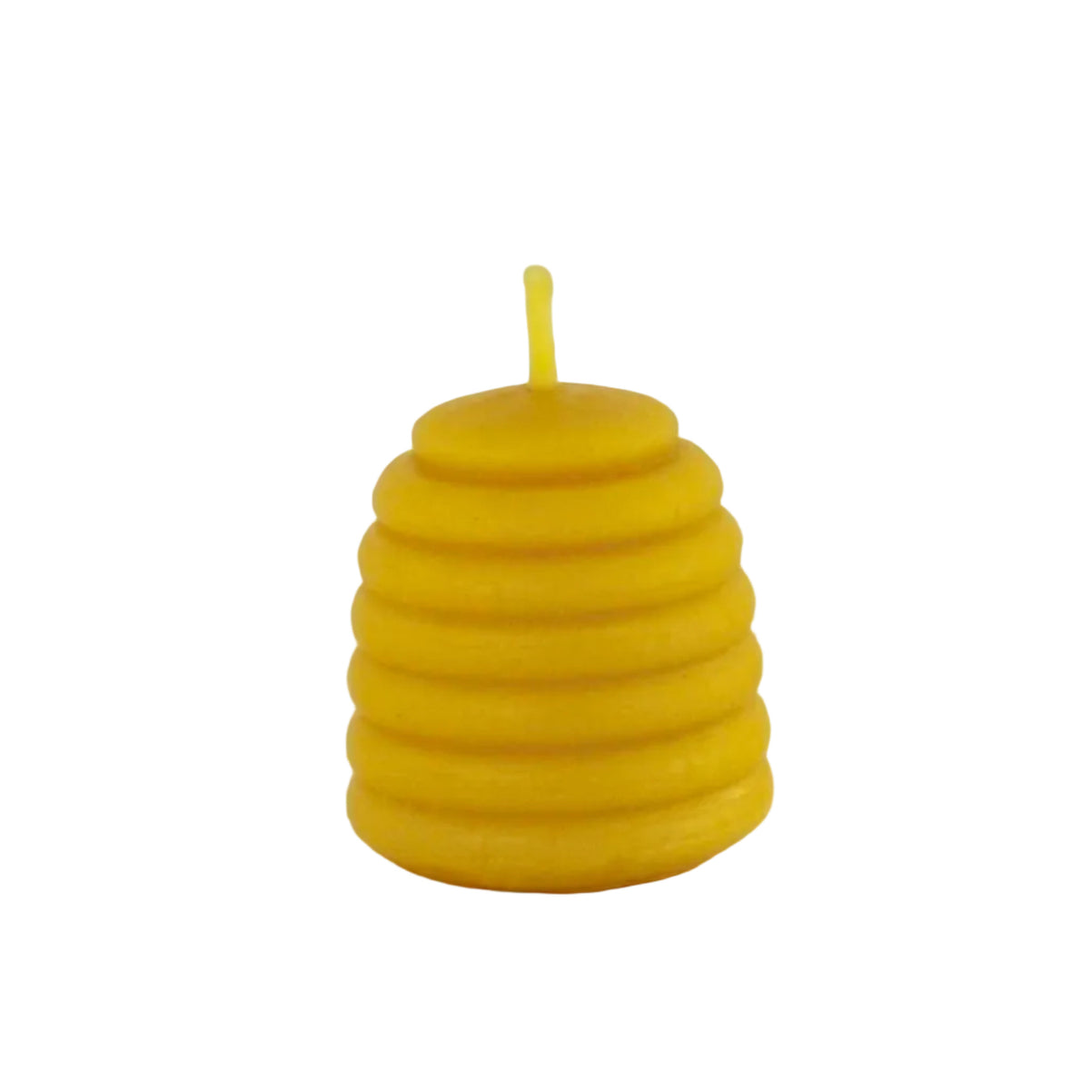 A small yellow beeswax candle shaped like a honeycomb bee's nest, featuring horizontal ridges and a short wick on top, set against a plain light background.